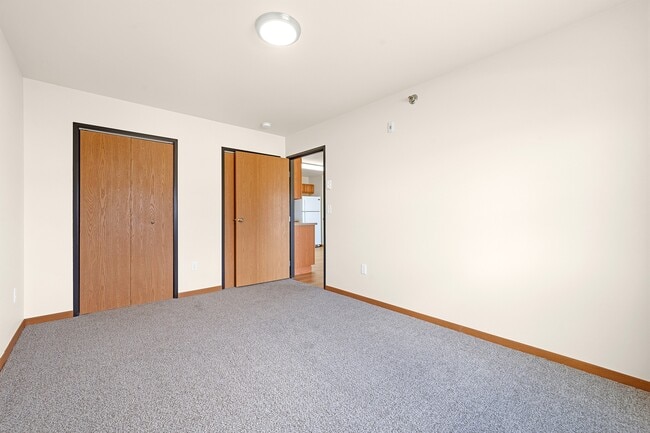 Step into spacious living at Paramount at the Bluffs Apartments. This inviting area features plenty of natural light and ample closet space, perfect for your lifestyle. Don't miss out on your ideal home—schedule a tour today! - Paramount at the Bluffs Apartments