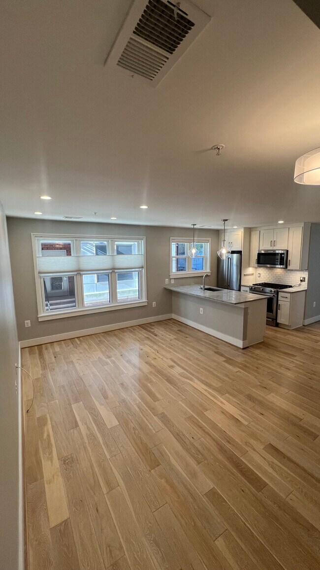 Kitchen Bar + Living Room Area - 2B @ The McCoy