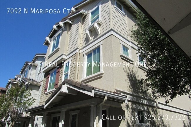 Building Photo - 7092 N Mariposa Ct