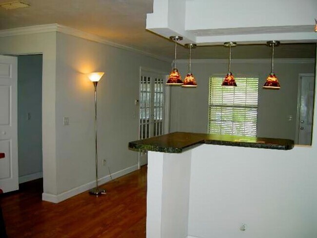 Building Photo - MODERN 3/2 w/ Huge Den, Screened Porch, Privacy Fenced Yard, Workshop, & 1703 sq ft! $1895/month ...