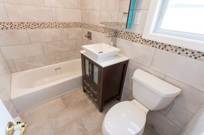 Building Photo - 72-18 Kessel St