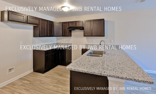 Building Photo - 8515 McGirts Village Ln