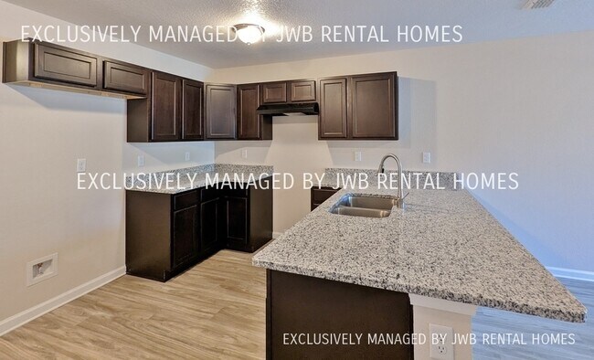 Foto del edificio - 8515 McGirts Village Ln