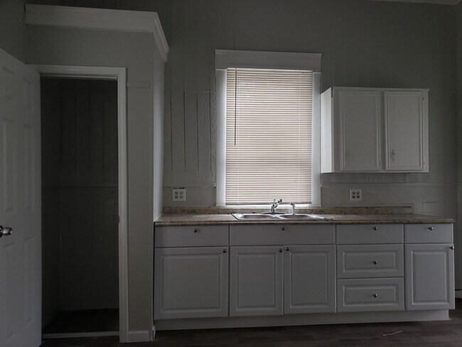 Building Photo - Completely Renovated House with Huge backy...
