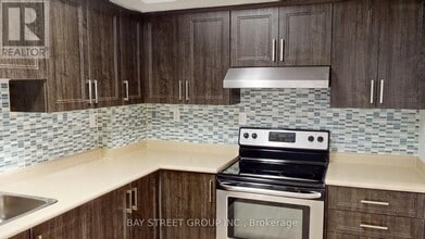 Building Photo - 1448-1448 Outlet Dr