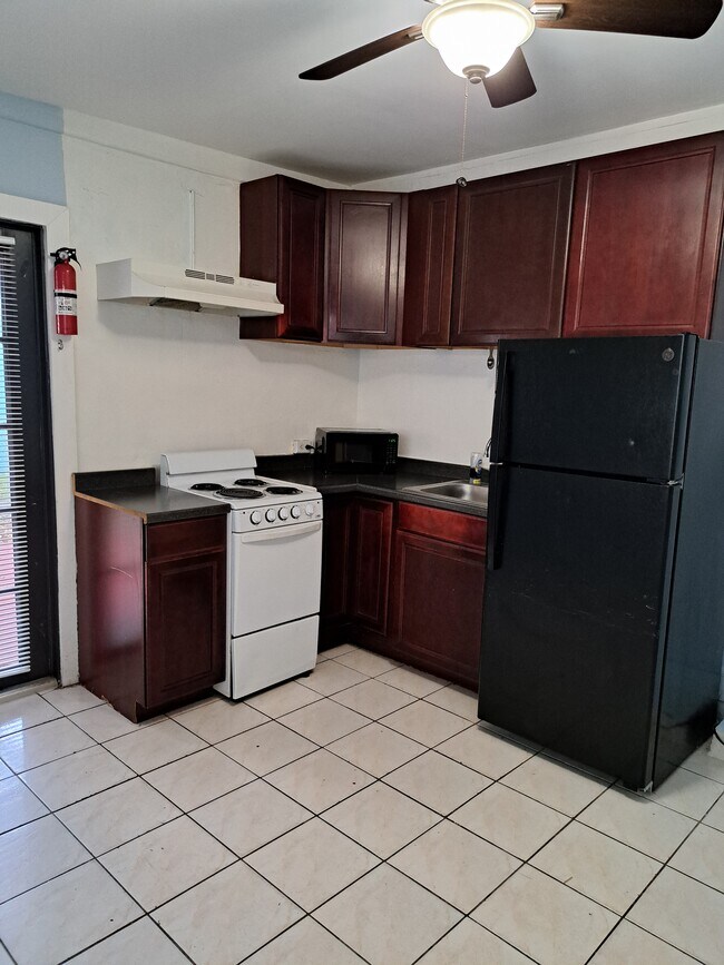 Building Photo - 6444 NW Miami Pl