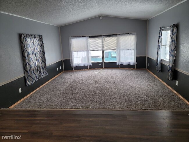 Building Photo - 2 br, 1 bath Mobile Home - 129 W 10th St