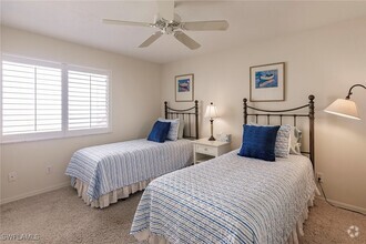 Building Photo - 7048 Pelican Bay Blvd