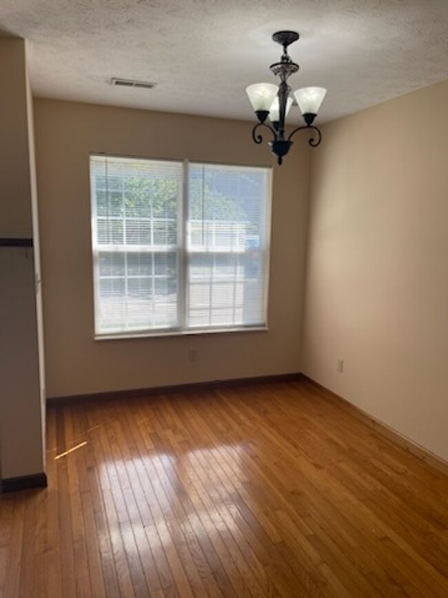 Building Photo - Three Bedroom two and half bath townhome i...