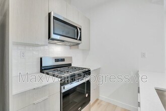 Building Photo - 7728-7105 105 Ave NW