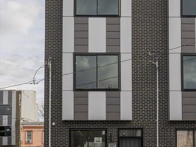 Building Photo - brand-new 3-bedroom, 3-bathroom row house