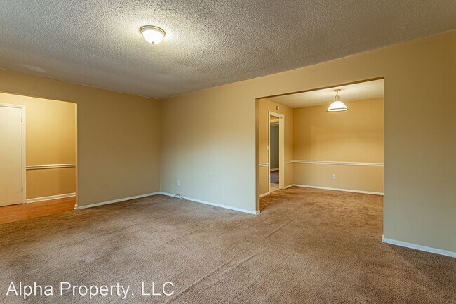 Building Photo - 3 br, 2 bath House - 128 Saturn Lane