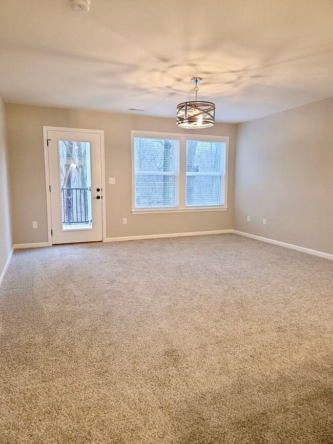 Building Photo - Exquisite brand new condo w/everything! Ground floor, no stairs, attached garage