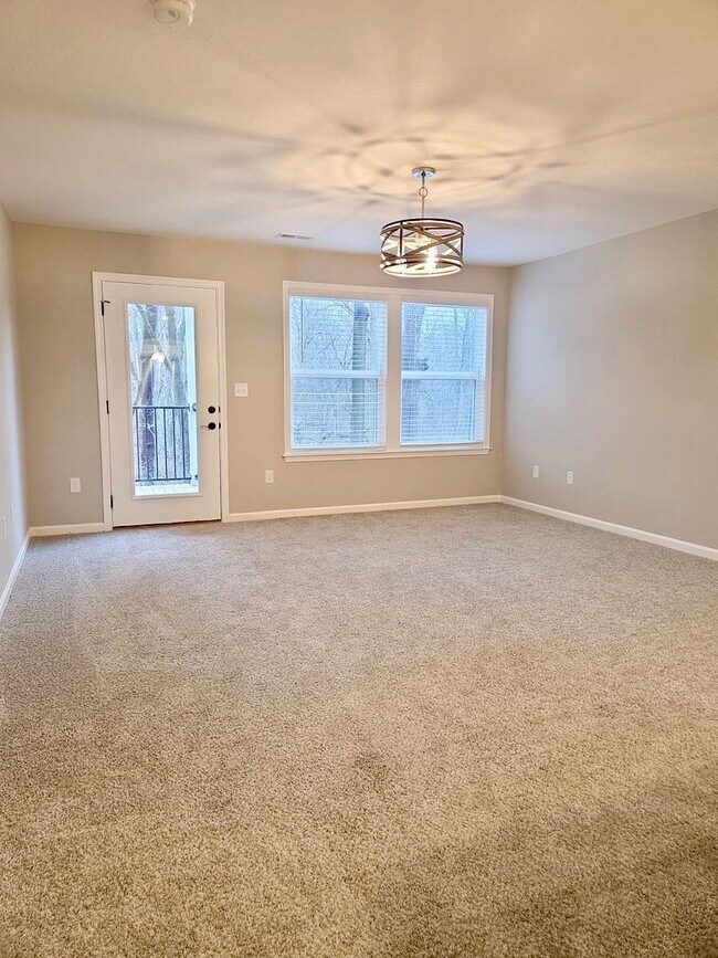 Building Photo - Exquisite just built condo with everything! Ground floor, no stairs, attached garage