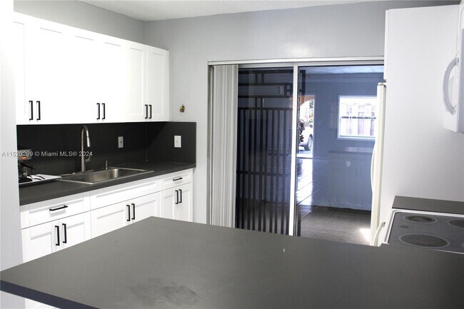 Building Photo - 7692 W 29th Ln
