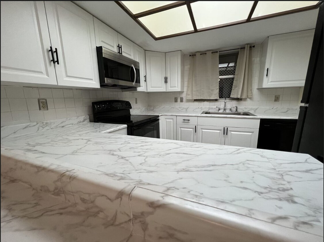 Foto principal - 156 Douglas Rd W
