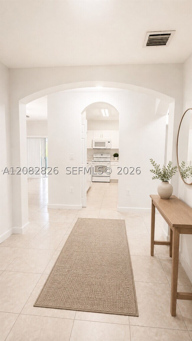 Building Photo - 1570 NE 33rd 103-11