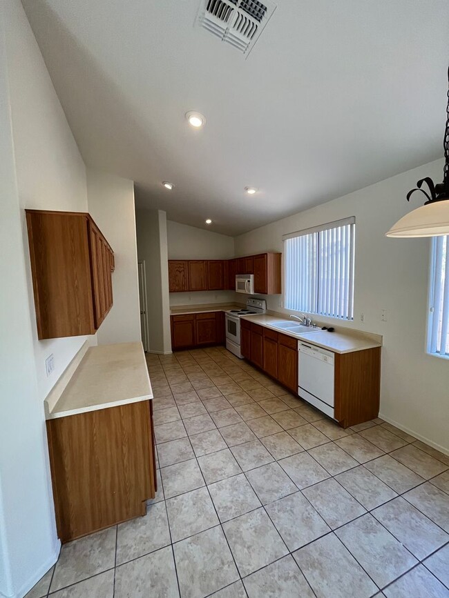 Building Photo - 4 Bedroom, 2 Bath with new Interior paint ...