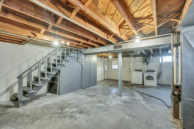No basement sharing in this unit. Far from the dungeon feeling of many city basements, this basement has plenty of natural light, full height ceiling, and comes with full size washer and dryer. - 3443 Lawn Ave