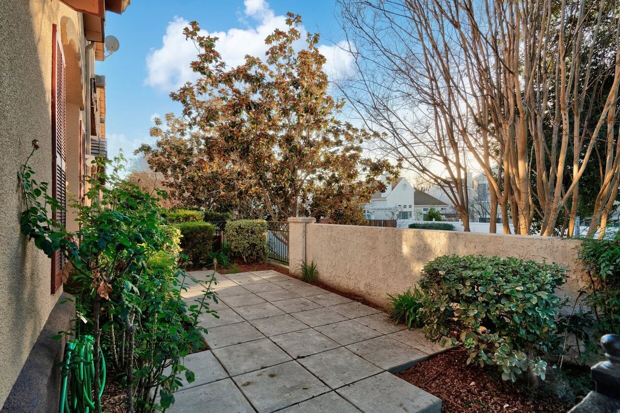 Primary Photo - UPGRADED TOWNHOME OFFERS UTMOST CONVENIENCE