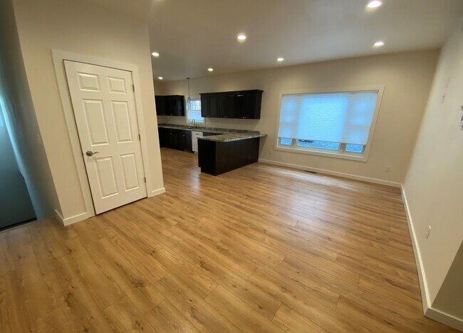 Living area & Coat closet - 214 S Minnesota Ave