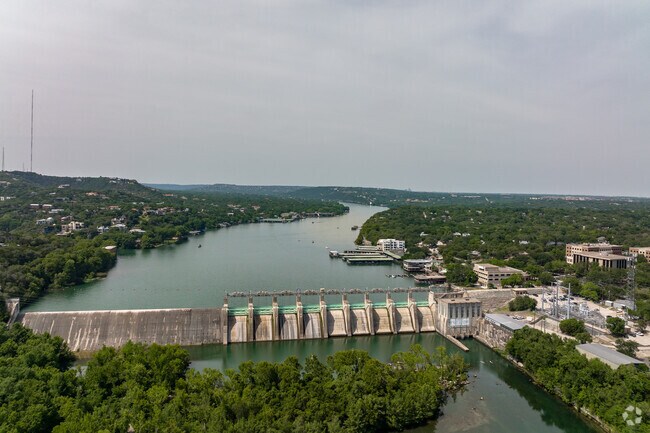 Lake Austin and its dam offer scenic views near West Lake Hills.