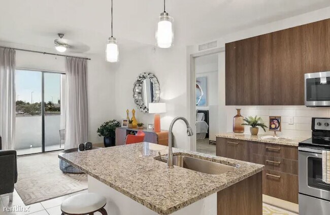 Building Photo - Studio, 1 bath Condo - 8850 NW 36th St APA...