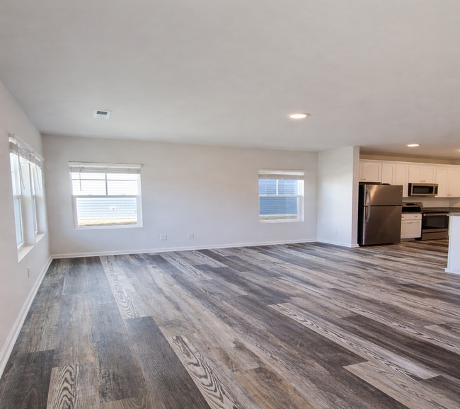 Building Photo - COMING SOON: 3BR Townhome • Full Kitchen • Garage + Driveway