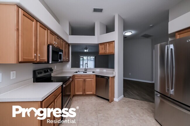 Foto del edificio - 8133 Alamosa Wood Ave