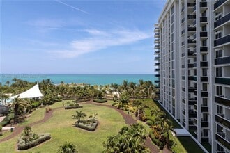 Building Photo - 10275 Collins Ave