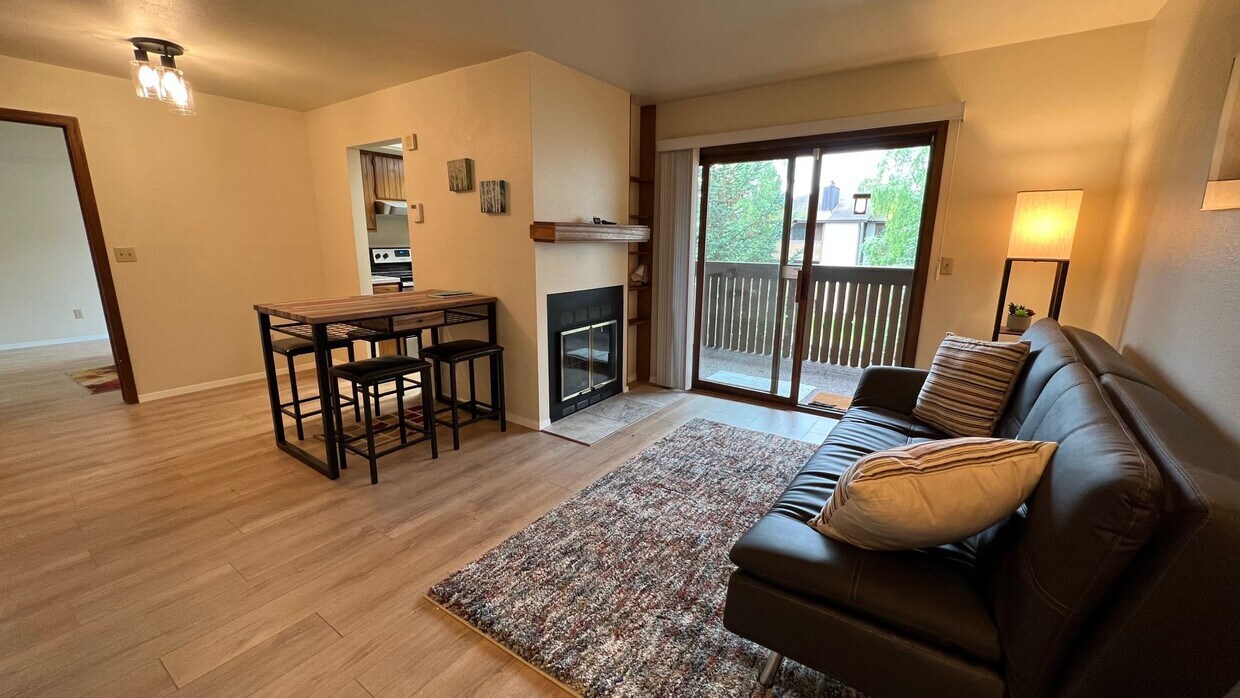 Primary Photo - Furnished 2 Bed Top Floor Condo with Garag...