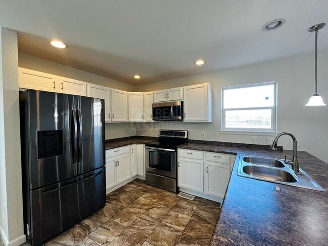 Building Photo - 2055 W 86th Ave