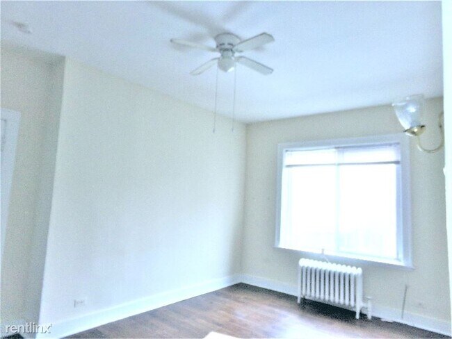 Foto del edificio - 6916 N Lakewood Ave
