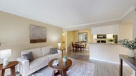 Located at 7100 Almeda in Houston, TX, this single-floor, 3-bedroom, 3-bathroom home offers a thoughtfully designed layout with a warm and inviting ambiance throughout. The open-concept living and dining area features crown molding, warm neutral tones, and wood-look flooring that flows seamlessly from the living space into the dining area. The kitchen is equipped with black appliances including a range, microwave, and refrigerator, complemented by granite countertops, white cabinetry, and a pass-through counter that connects to the dining space. Each of the three bedrooms is carpeted and bathed in natural light from large windows, with ceiling fans providing added comfort. The spacious primary bedroom includes a dedicated closet. The three bathrooms are finished with granite vanity countertops, tile-surround tub-shower combinations, and wood-look flooring, maintaining a clean and consistent aesthetic. Additional storage is provided by two closets, one of which houses the water heater. Crown molding accents the common areas, adding a refined touch to the overall design. The unit combines functional living spaces with cohesive finishes, making it a practical and comfortable home in the Houston Medical Center area.