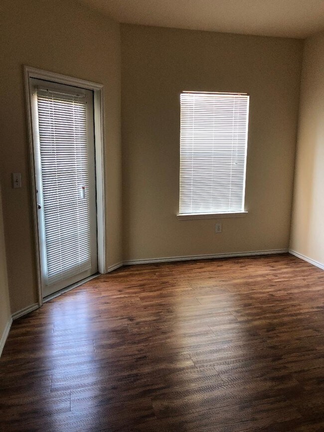 A1 Living Room - Legacy Oaks Apartments