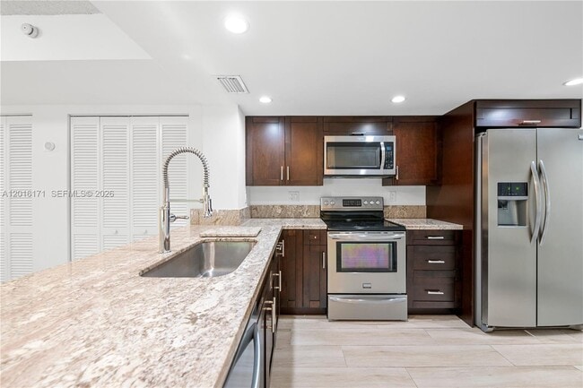 Building Photo - 5201 Orduna Dr