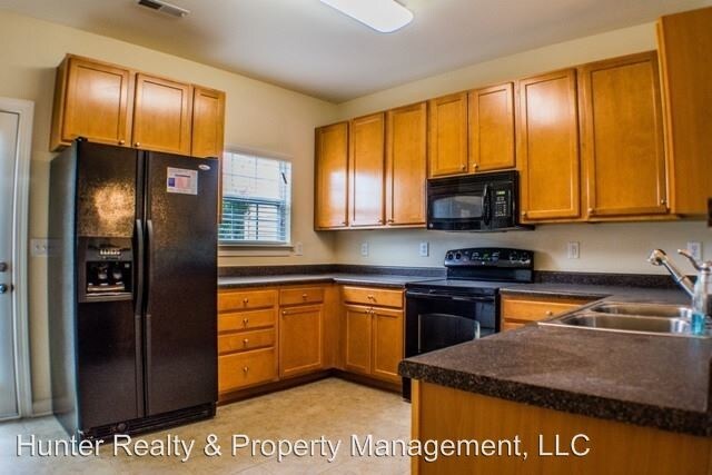 Building Photo - 2 br, 2.5 bath House - 4513 Brassfield Dr.