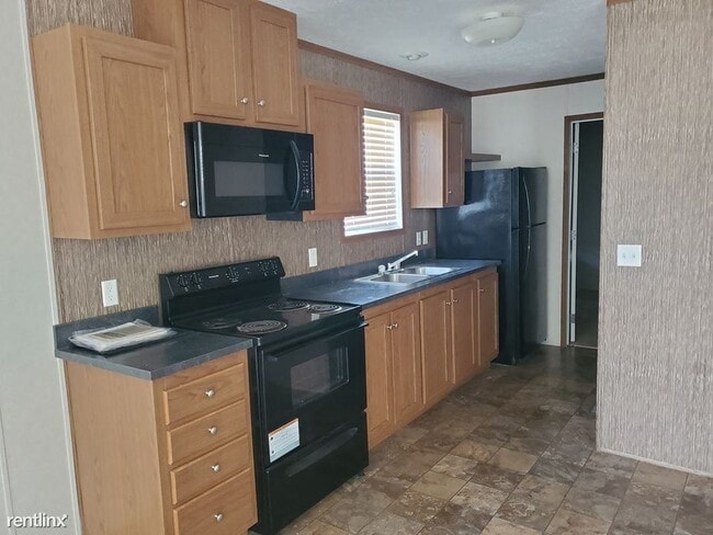 Building Photo - 3 br, 1 bath House - 1301 Devils Glen Rd L...