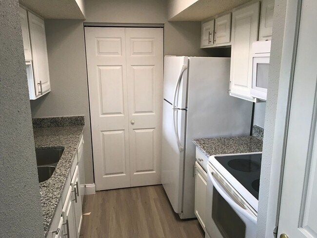 Building Photo - Charming Condo Living in the Gated Community of Cabana Key!