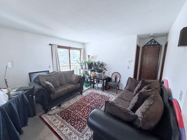 Building Photo - Stylish Townhome-Style 1BR with Patio, Garage & In-Unit Laundry!