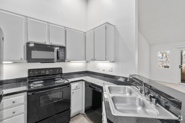 2BR, 2BA - 950SF - Kitchen - Elan Riverwalk