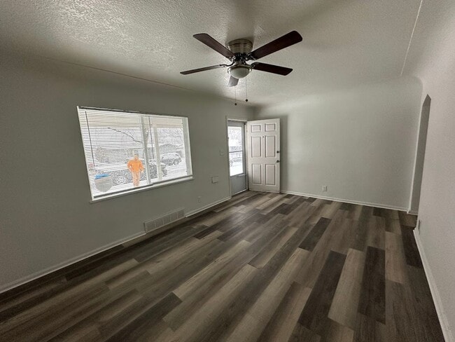 Photo - Spacious 4 Bedroom Home | 2 Living Rooms | Large Fenced Yard | 1,700+ Sq Ft