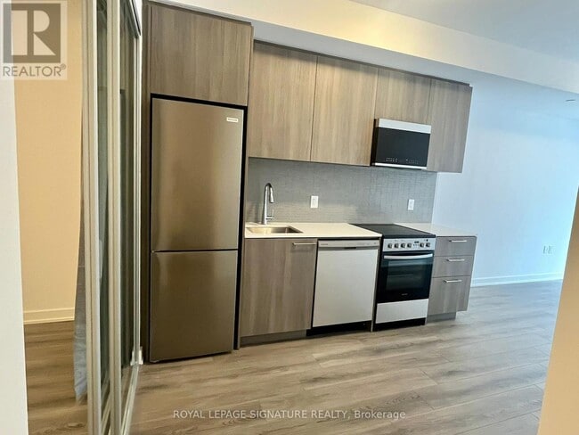 Building Photo - 7437 Kingston Rd