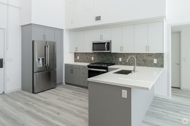 2BR, 2BA - 1,232SF - B1 Loft - Kitchen - Aurum