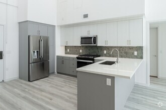 2BR, 2BA - 1,232SF - B1 Loft - Kitchen - Aurum