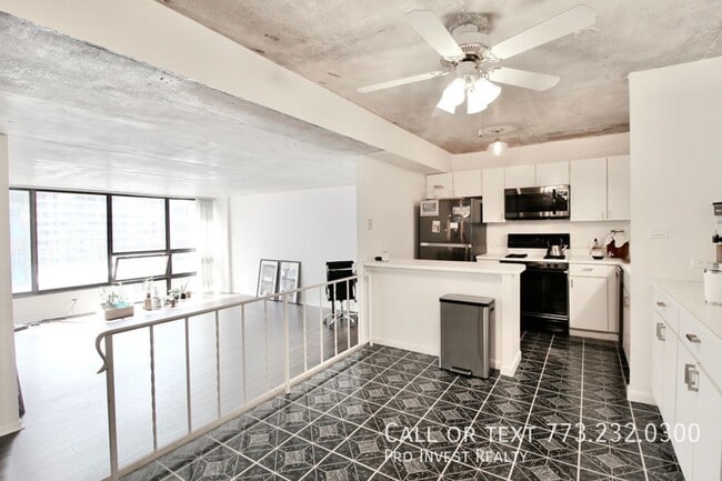 Building Photo - Available July 1st! Sun-filled Oversized 1...