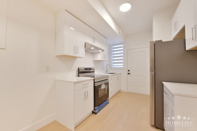 Building Photo - Brand New 2 Bedroom + Den Basement Suite in Desirable South Surrey