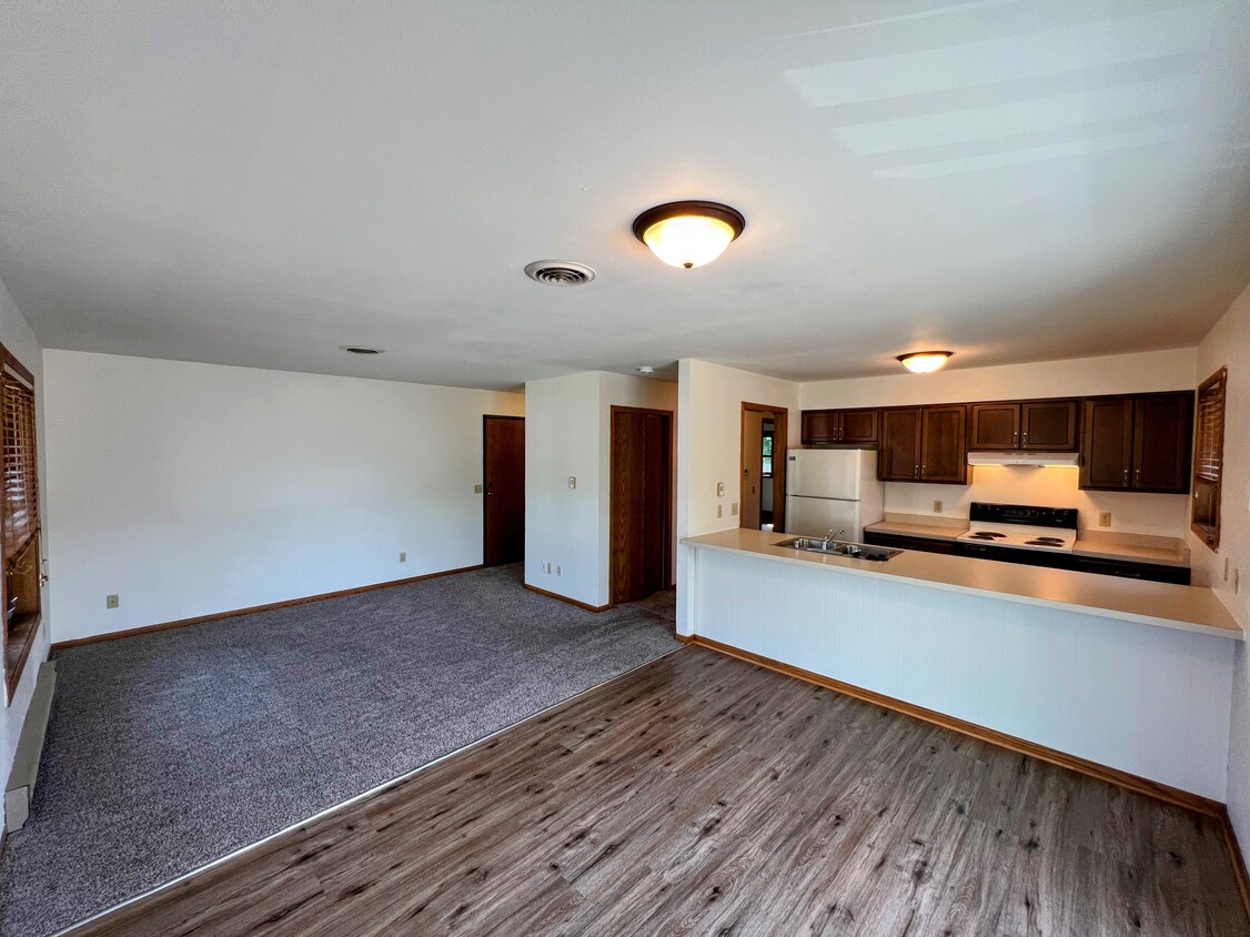 Open Floor Plan Living, Dining, and Kitchen Space - 215 Ash Street