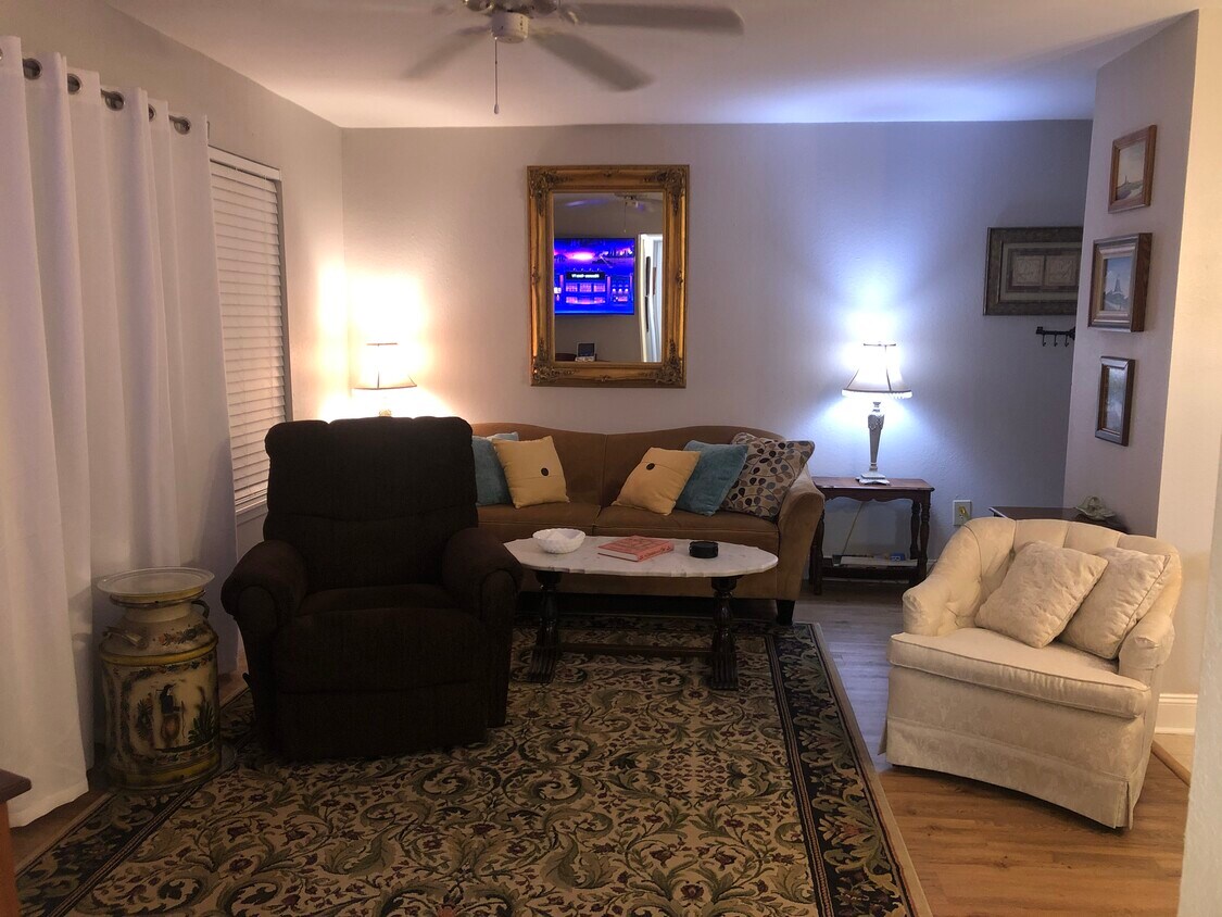 Evening glow in the living room. - 3565 Sable Palm Ln