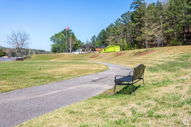 A walking trail and bench at Beacon Park.